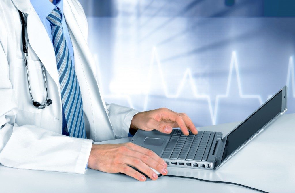 doctor using laptop
