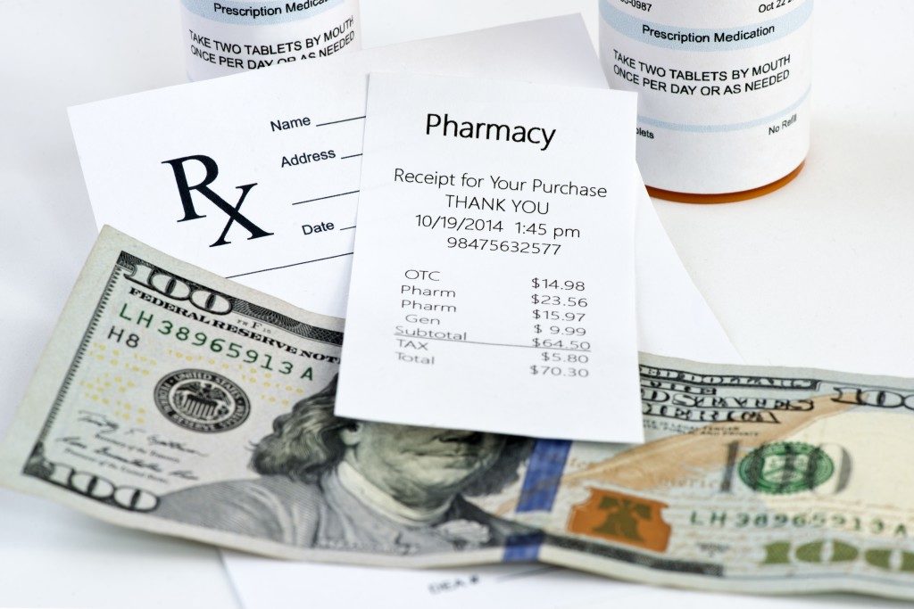 Pharmacy receipt with prescription bottle