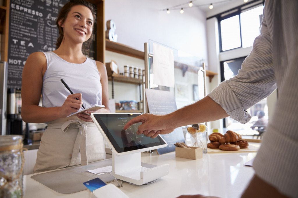 Customer paying at the cashier