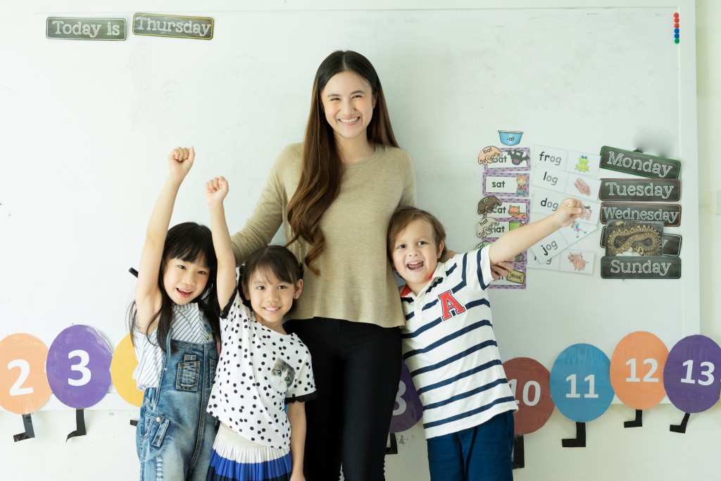 teacher with her students