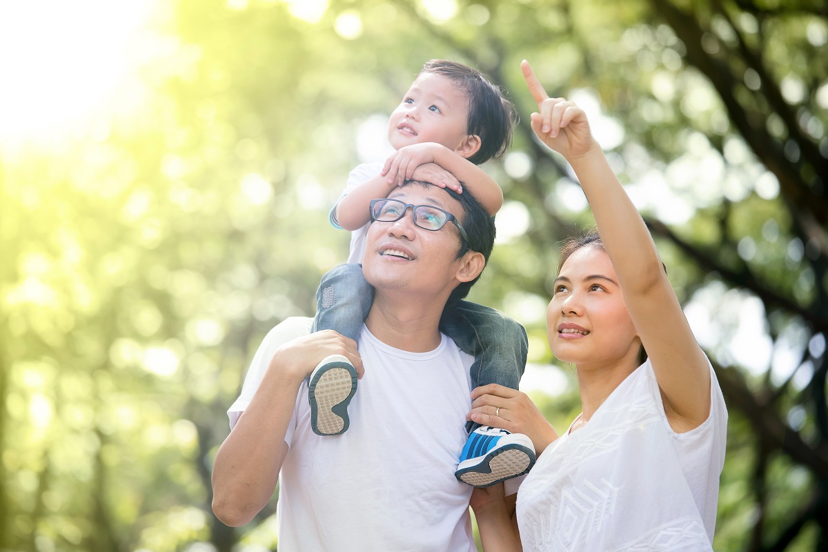 family walking in the park