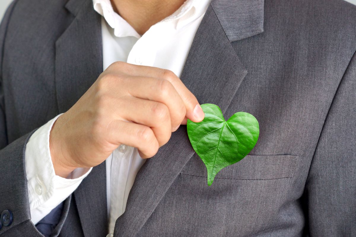 holding heart shaped leaf