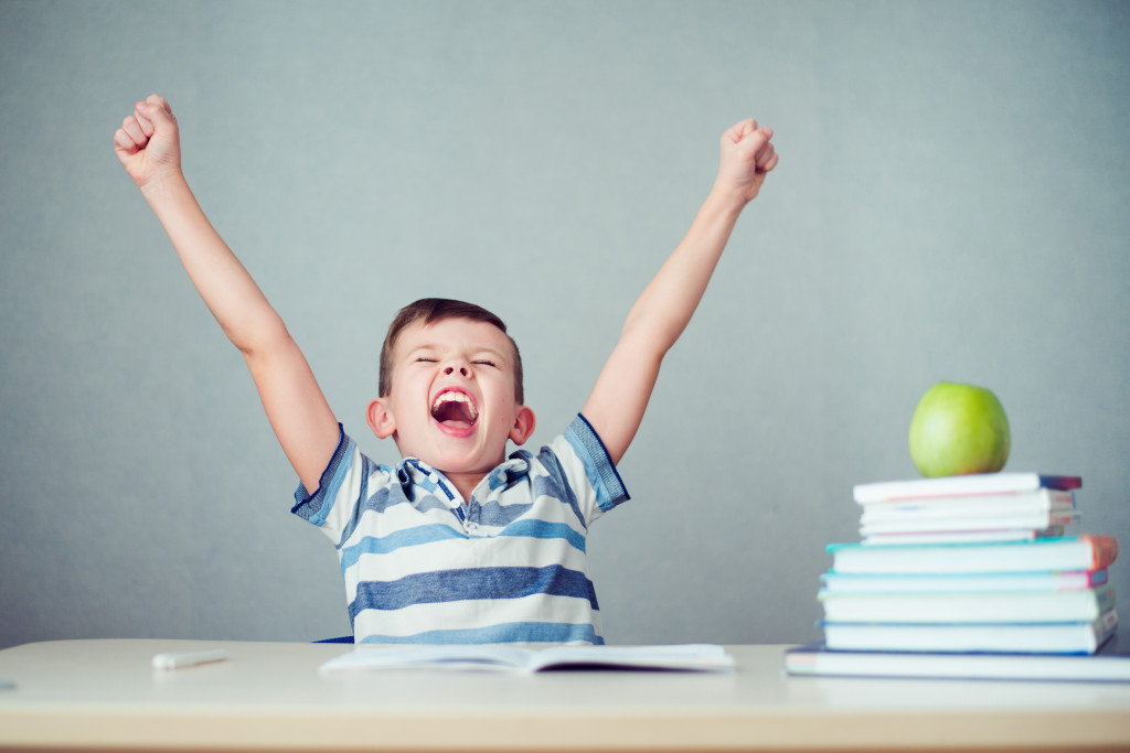 a child shouting for joy