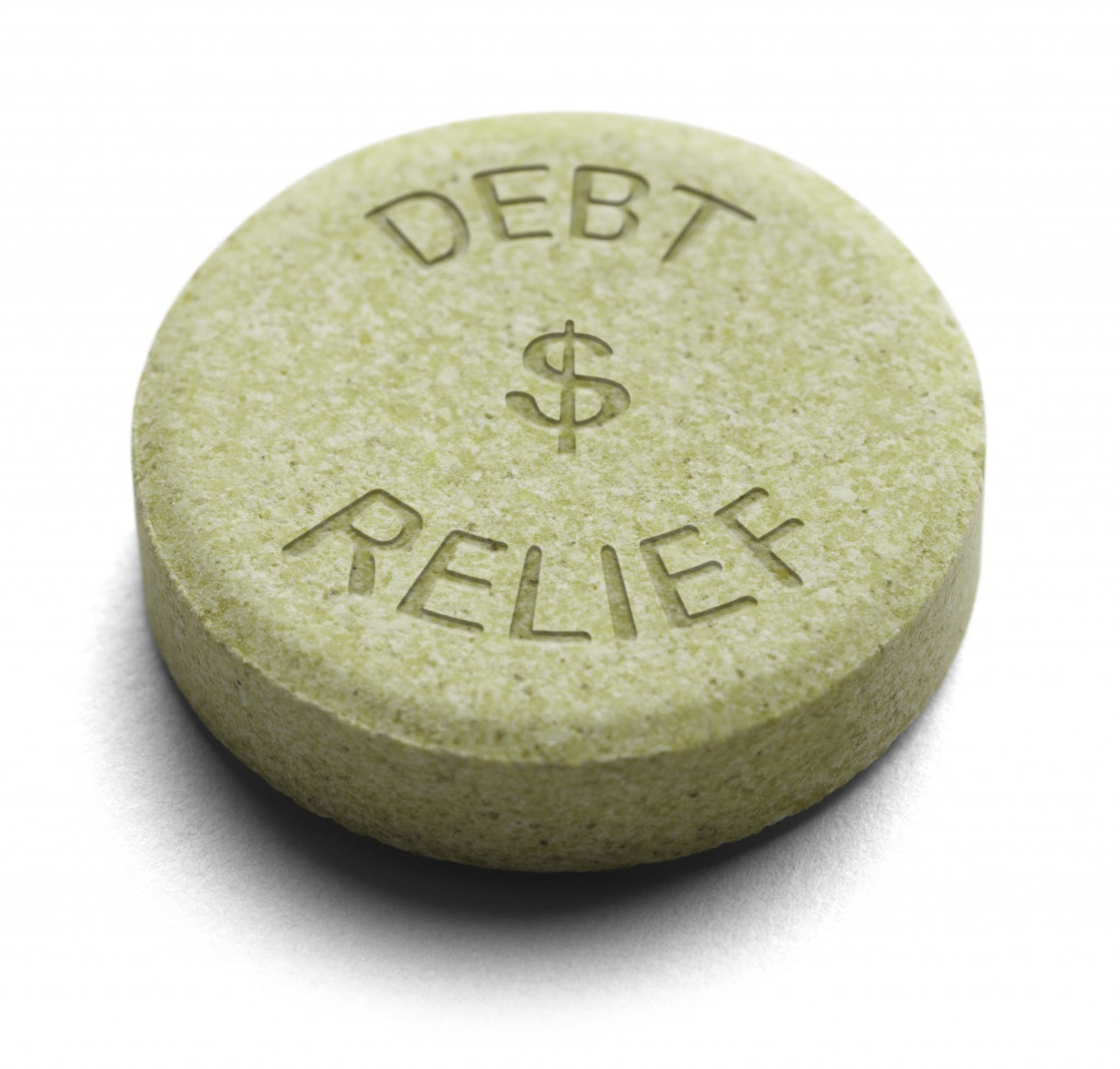 a stone with the words "debt relief" written on it