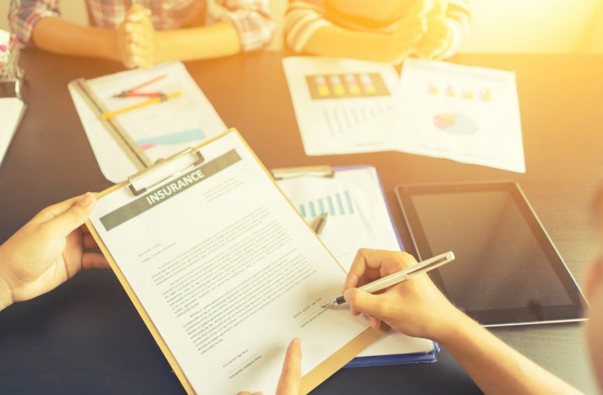 someone signing a contract