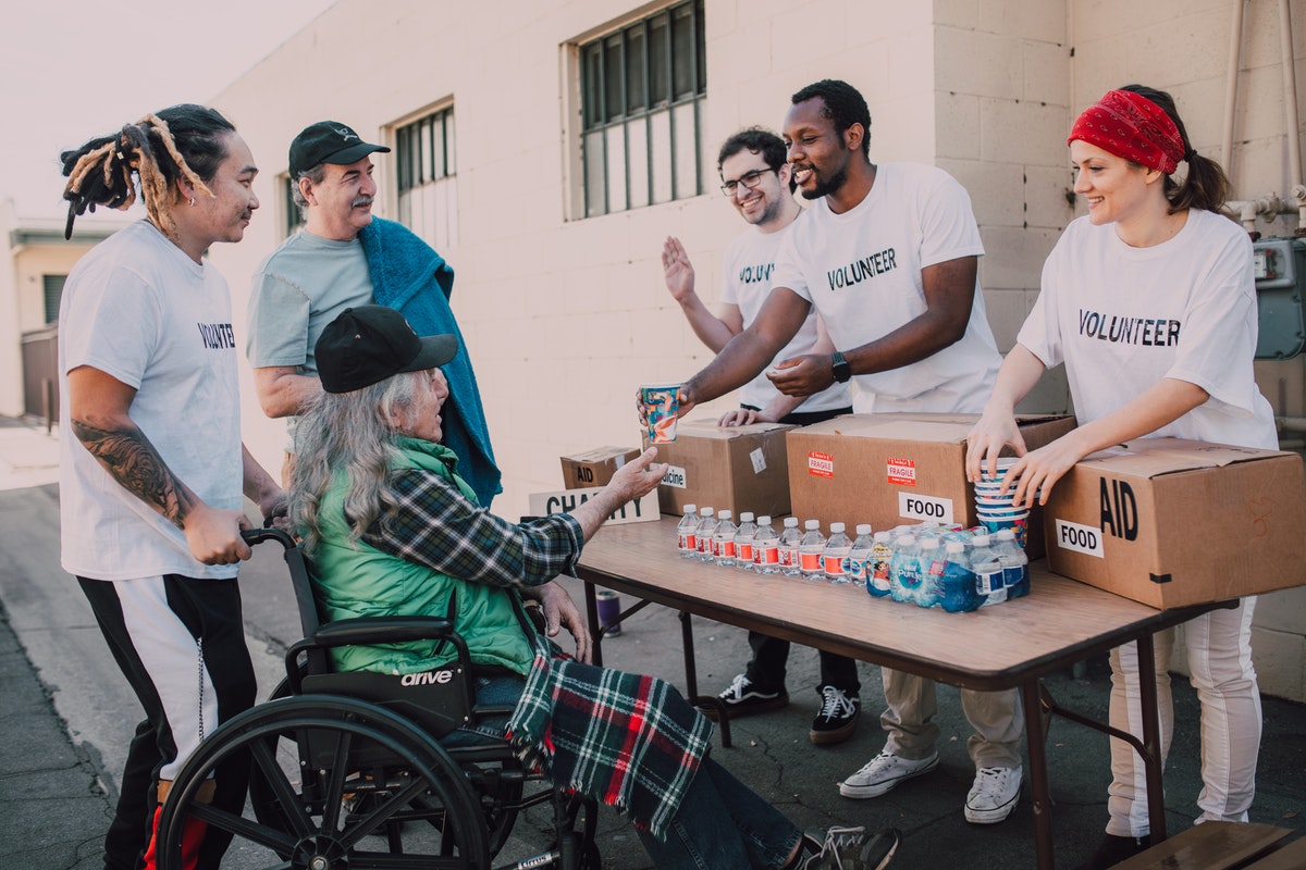 volunteers helping in a community