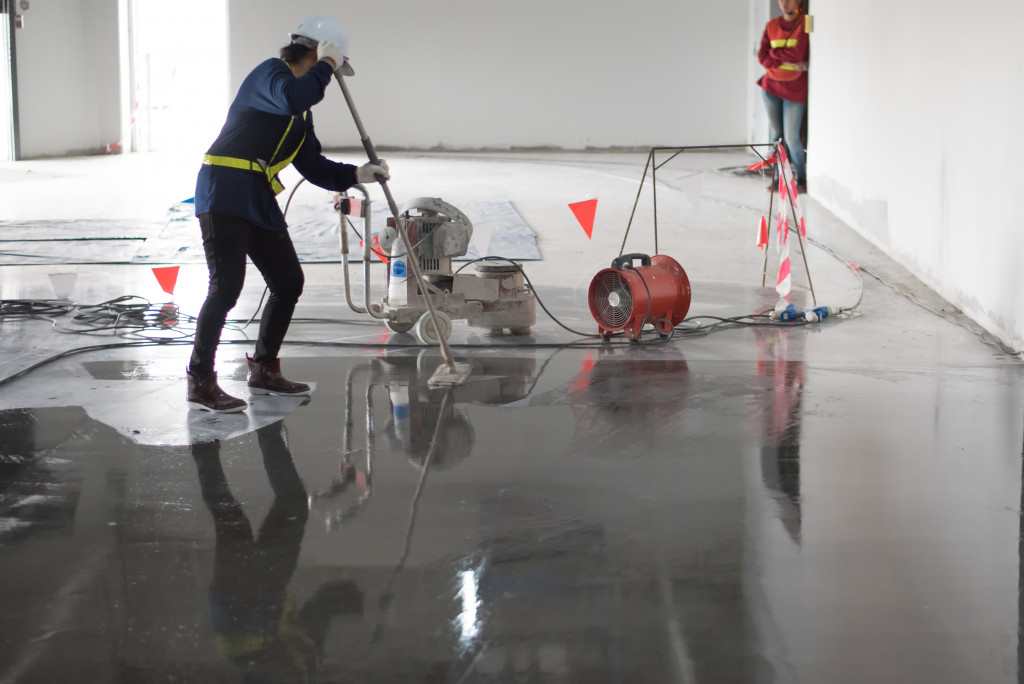 Applying epoxy coating to an industrial floor