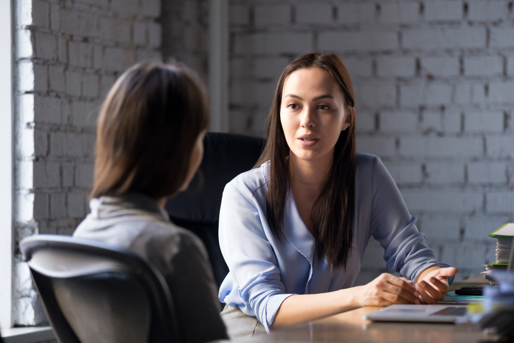 manager talking to an employee