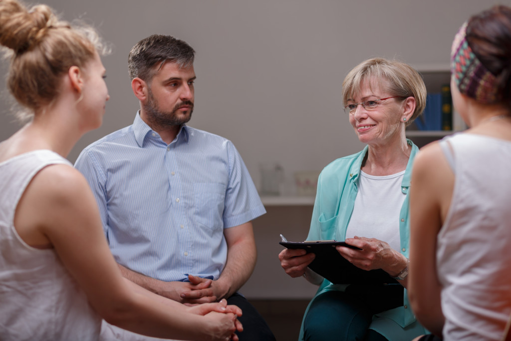 group of people in a counseling session