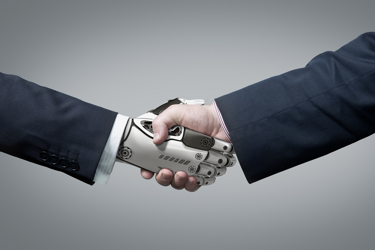 robot hand shaking hands with business hand concept of AI