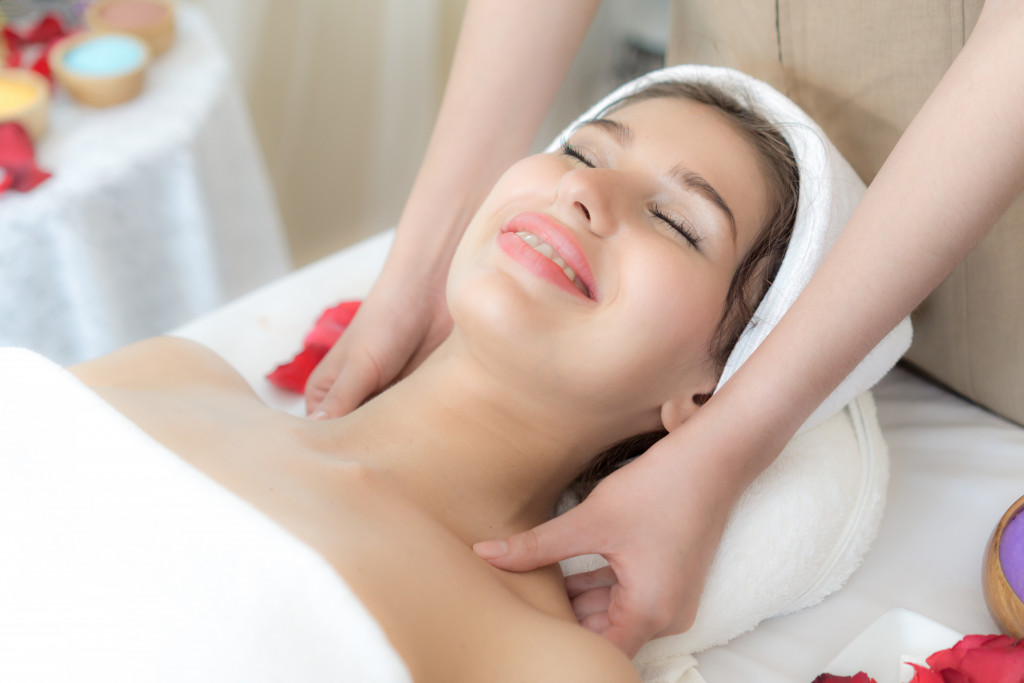 Young woman receiving a spa treatment. 