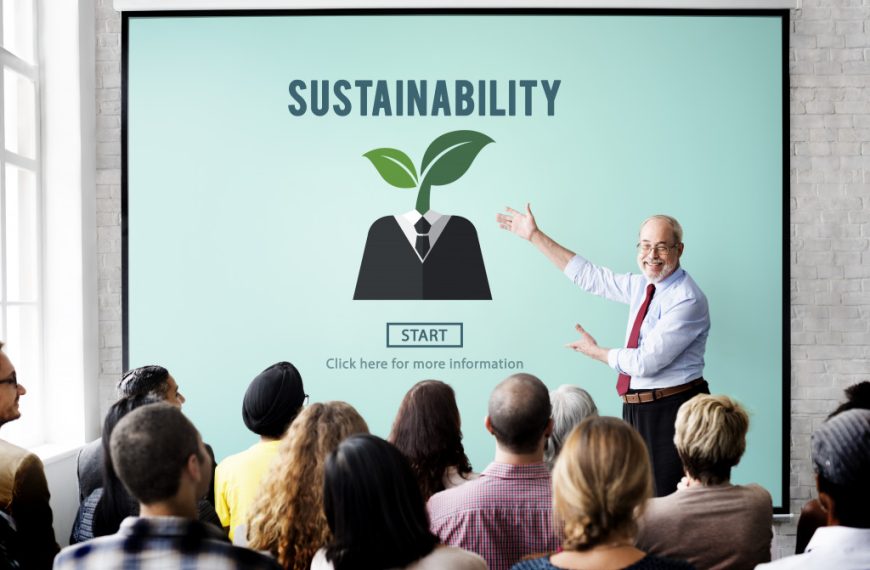 Business owner showing employees its aim of operating sustainably.