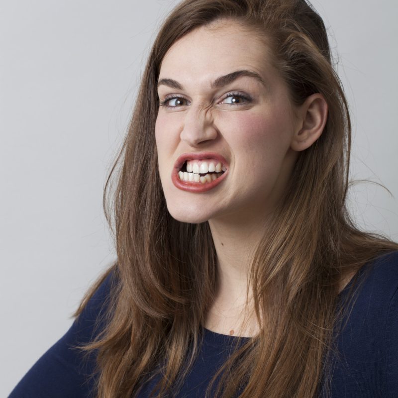 Teeth grinding woman