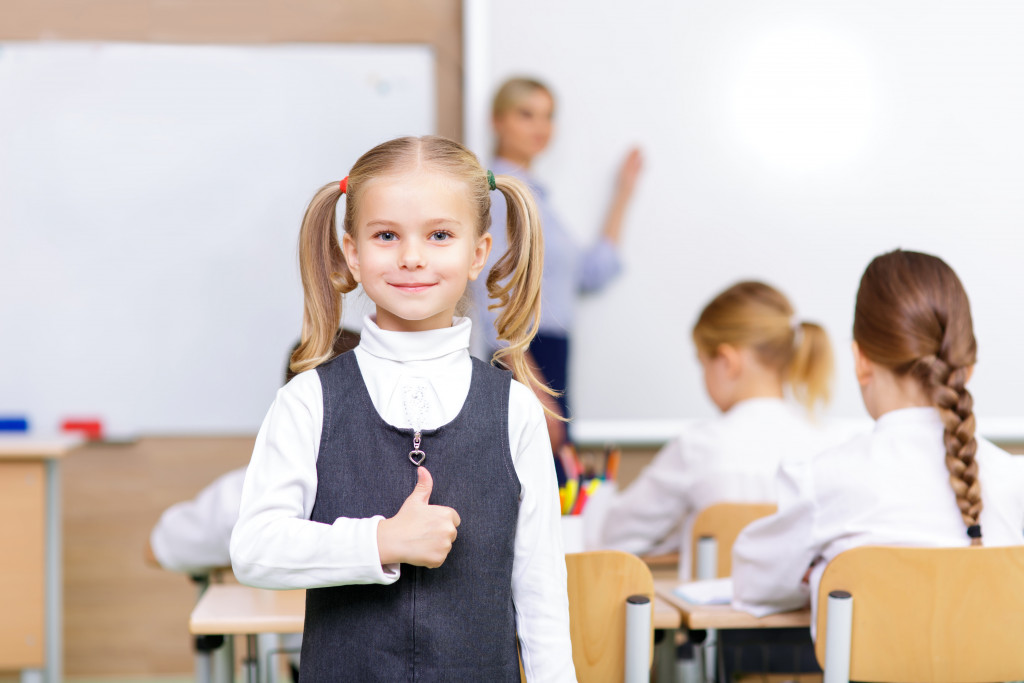 cute girl smiling in school