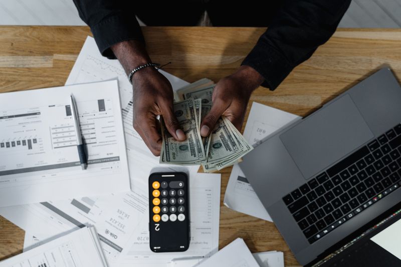 counting money on a desk